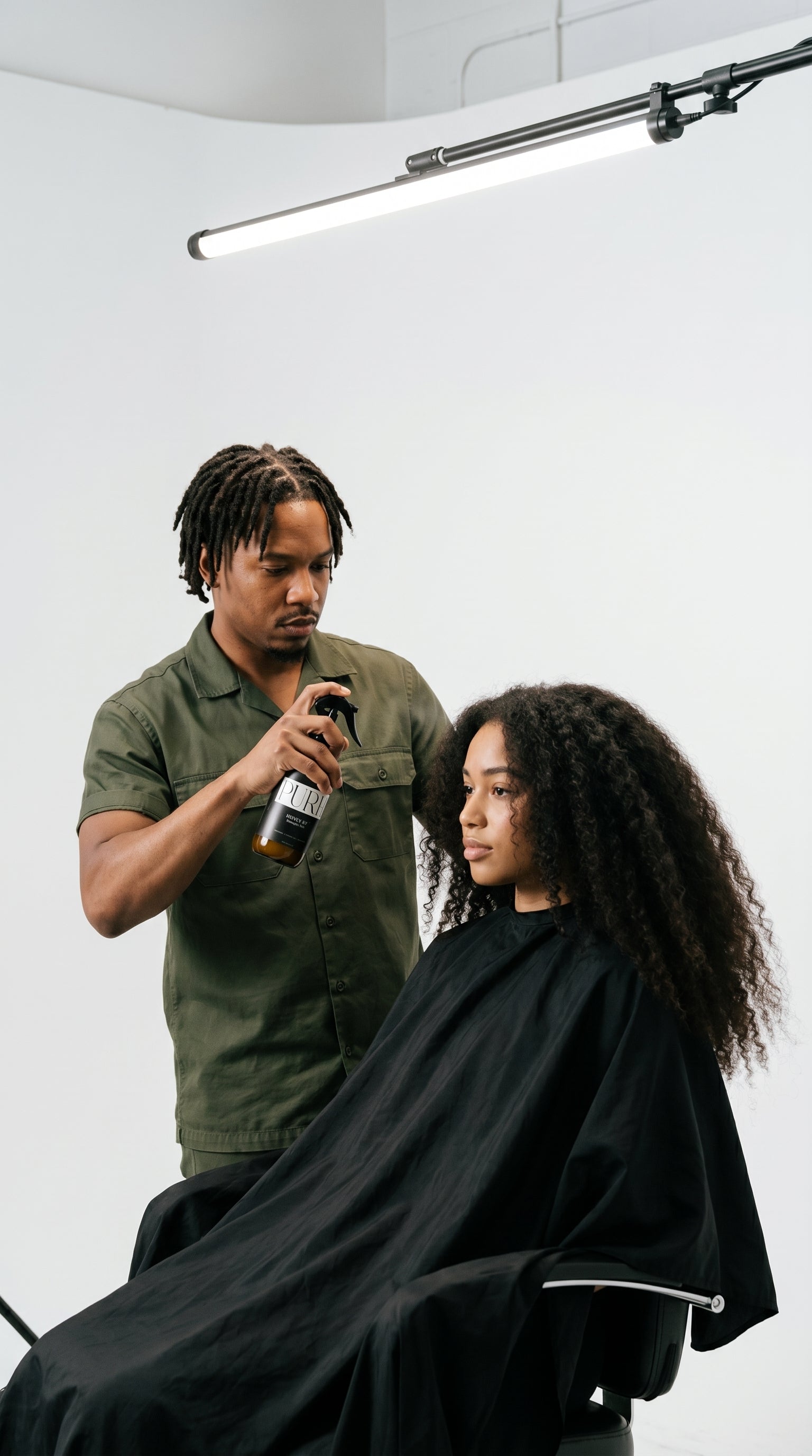 PURH Honey B7 Detangling Mist providing hydration, shine, and effortless detangling.